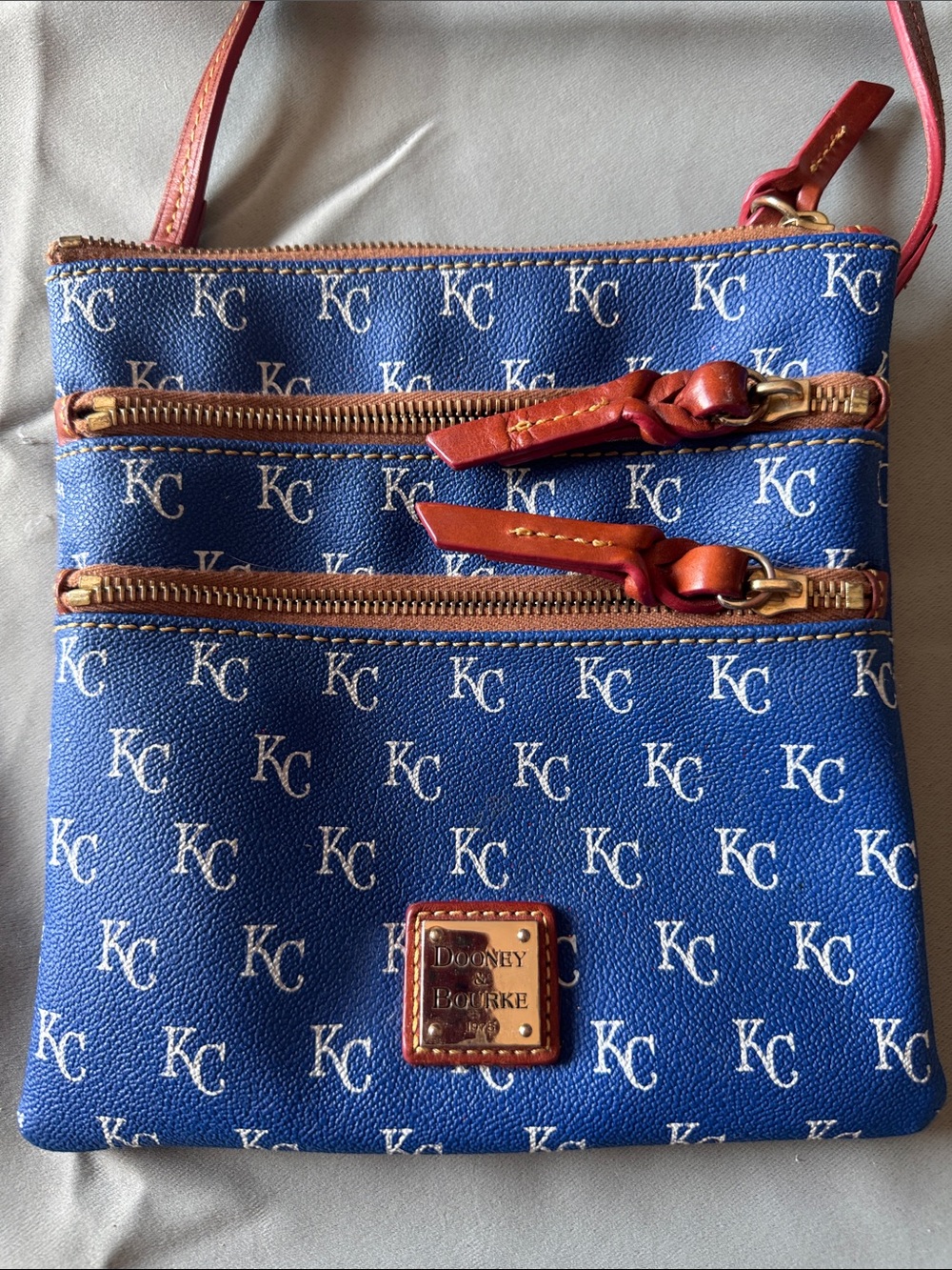 Dooney & Bourke Blue KC Monogram Triple-Zip Crossbody with Brown Trim